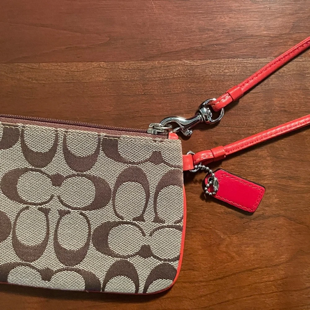 COACH Signature Fabric with Orange Leather Wristlet